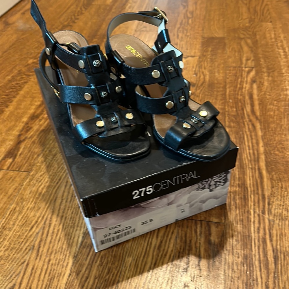 275 sandals w studs. Beautiful and comfortable. Gently used. In great condition
